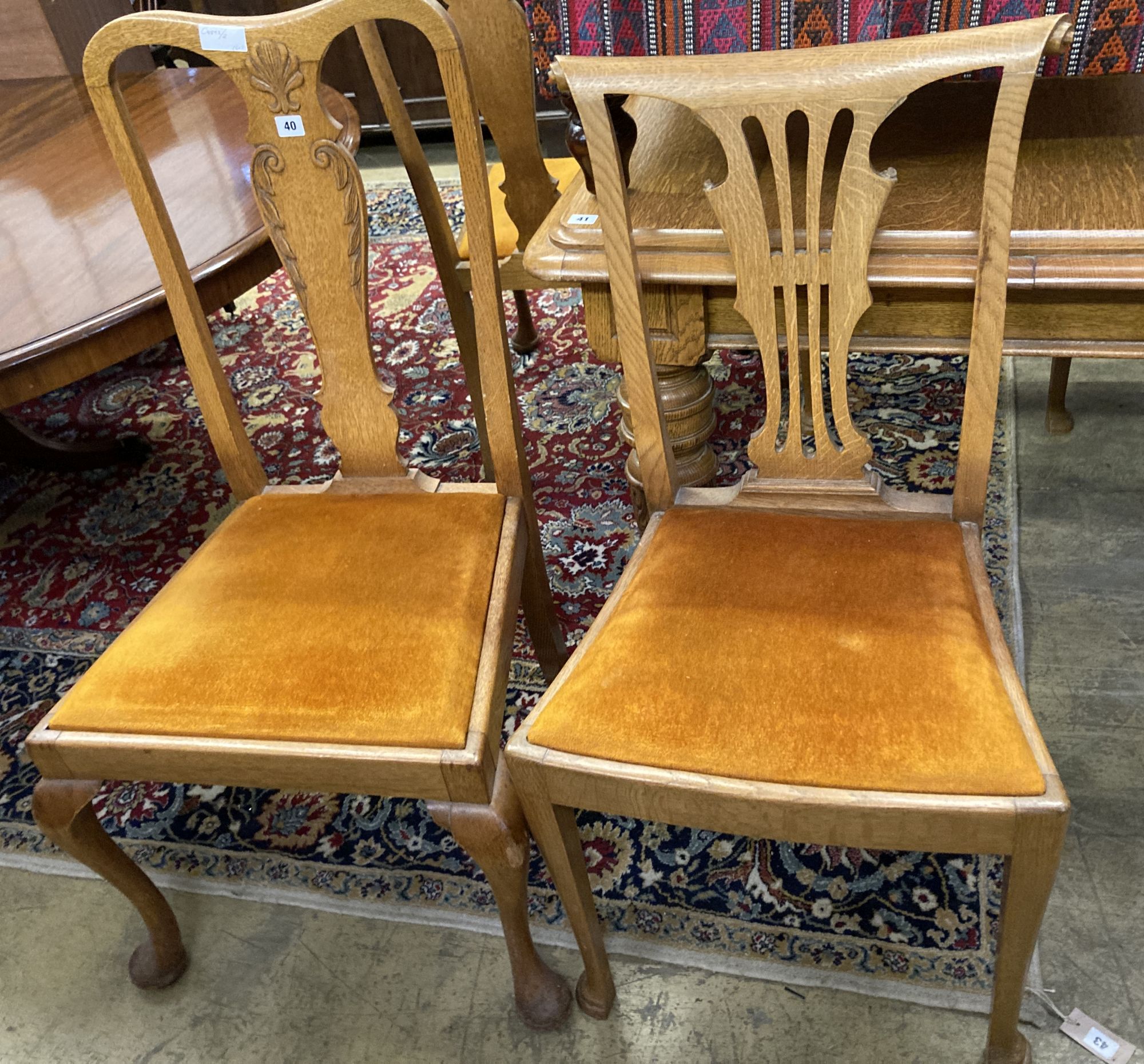 A set of six early 20th century oak dining chairs together with three carved oak dining chairs